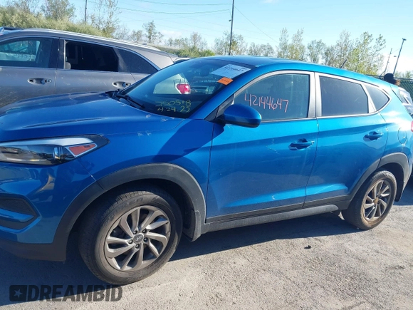 2018 Hyundai Tucson SE z VIN KM8J2CA40JU792495, wystawiony jako IAAI lot #42144647 z przebiegiem 62 769 mil mil oraz . Historia ofert i sprzedaży dostępna na DreamBid. Obrazek 14.