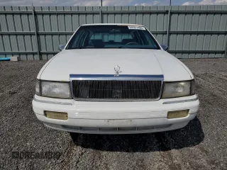 1992 Chrysler LeBaron z VIN 3C3XA5633NT336573, wystawiony jako Copart lot #54551495 z przebiegiem Nie podano mil oraz Tytuł czysty. Historia ofert i sprzedaży dostępna na DreamBid. Obrazek 5.