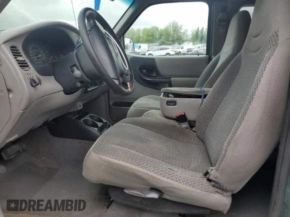 1999 Ford Ranger XL with VIN 1FTYR14V6XPA93323, listed as a Copart auction lot 59769985 with 345,075 mi miles and Salvage title. Bid and sale history available at DreamBid. Image 7.