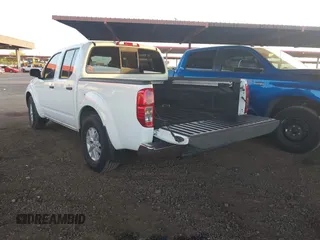 2021 Nissan Frontier SV z VIN 1N6ED0EA3MN710382, wystawiony jako IAAI lot #42083600 z przebiegiem 43 022 mil mil oraz . Historia ofert i sprzedaży dostępna na DreamBid. Obrazek 3.