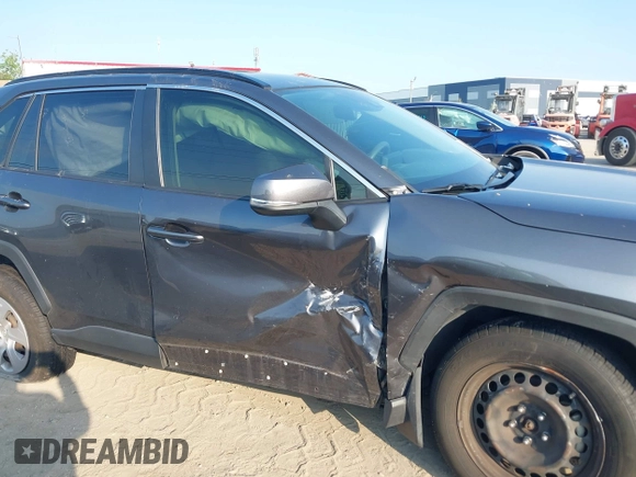 2019 Toyota RAV4 LE with VIN JTMK1RFV0KD003070, listed as a IAAI auction lot 42051761 with 86,651 mi miles. Bid and sale history available at carsss.com. Image 6.