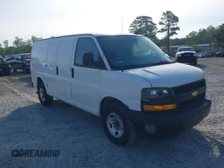 2021 Chevrolet Express Cargo Van with VIN 1GCWGAFP0M1206242, listed as a IAAI auction lot 42043866 with 148,087 mi miles. Bid and sale history available at carsss.com. Image 1.