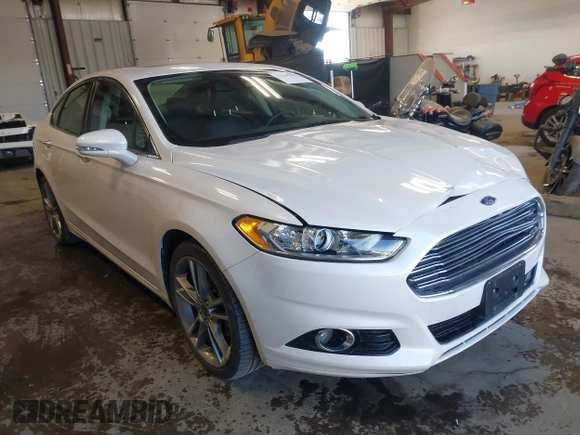 2016 Ford Fusion Titanium z VIN 3FA6P0D93GR116355, wystawiony jako IAAI lot #42158991 z przebiegiem 59 602 mil mil oraz . Historia ofert i sprzedaży dostępna na DreamBid. Obrazek 1.