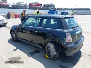 2013 MINI Cooper Hardtop with VIN WMWSU3C51DT691451, listed as a IAAI auction lot 42087943 with 132,570 mi miles. Bid and sale history available at carsss.com. Image 3.
