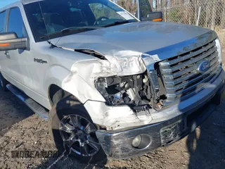 2012 Ford F-150 XL with VIN 1FTFW1CF7CKD28801, listed as a IAAI auction lot 41736499 with 166,001 mi miles. Bid and sale history available at carsss.com. Image 6.