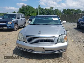 2005 Cadillac DeVille z VIN 1G6KD54Y15U158635, wystawiony jako IAAI lot #42469707 z przebiegiem 136 336 mil mil oraz . Historia ofert i sprzedaży dostępna na DreamBid. Obrazek 6.