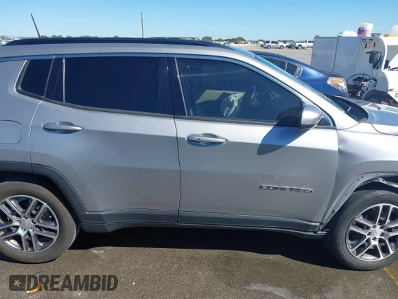 2019 Jeep Compass Altitude with VIN 3C4NJCBB1KT819754, listed as a IAAI auction lot 42083019 with 79,949 mi miles and . Bid and sale history available at DreamBid. Image 14.