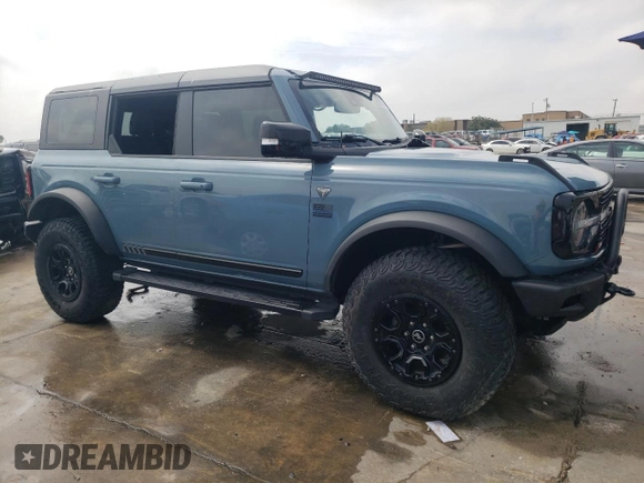 2021 Ford Bronco First Edition with VIN 1FMEE5EP0MLA42596, listed as a Copart auction lot 63210803 with Not Provided miles and . Bid and sale history available at DreamBid. Image 4.