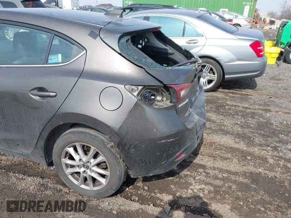 2014 Mazda 3 i Grand Touring with VIN JM1BM1M75E1207754, listed as a IAAI auction lot 41698583 with 128,887 mi miles and . Bid and sale history available at DreamBid. Image 18.