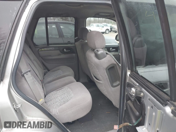 2004 GMC Envoy SLT with VIN 1GKDT13S242398113, listed as a IAAI auction lot 41722942 with 175,173 mi miles and . Bid and sale history available at DreamBid. Image 8.