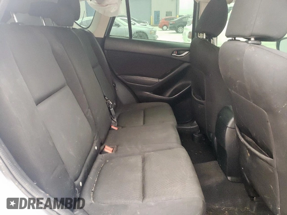 2016 Mazda CX-5 Sport с VIN JM3KE4BY3G0779206, выставлен на аукционе Copart как лот 58854805 с пробегом 144 434 миль миль и Чистый • Clean title. История ставок и продаж доступна на DreamBid. Изображение 10.