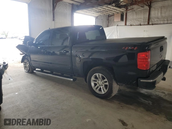 2018 Chevrolet Silverado 1500 LT with VIN 3GCUKREC2JG345482, listed as a Copart auction lot 52452445 with 100,824 mi miles and Salvage Title. Bid and sale history available at DreamBid. Image 2.