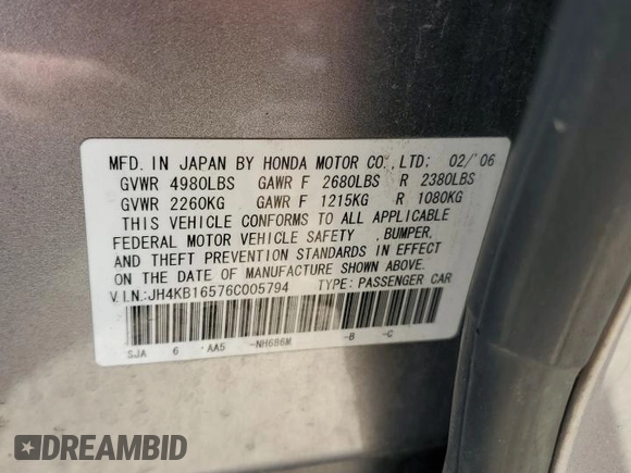 2006 Acura RL z VIN JH4KB16576C005794, wystawiony jako Copart lot #55167965 z przebiegiem 157 104 mil mil oraz Szkoda całkowita • Salvage title. Historia ofert i sprzedaży dostępna na DreamBid. Obrazek 13.