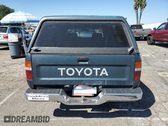 1994 Toyota Pickup DLX z VIN 4TARN81P2RZ175695, wystawiony jako Copart lot #50415385 z przebiegiem 258 048 mil mil oraz Szkoda całkowita • Salvage title. Historia ofert i sprzedaży dostępna na DreamBid. Obrazek 6.