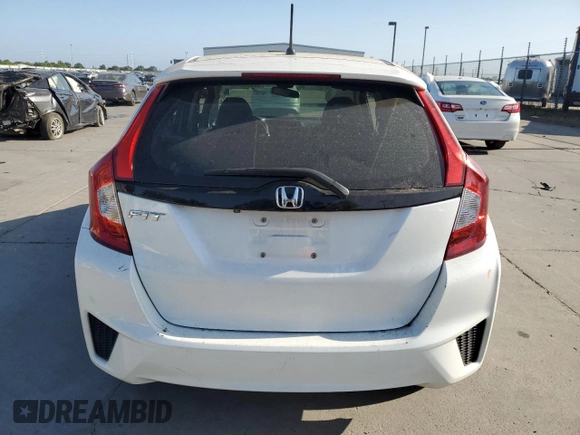 2016 Honda Fit LX z VIN JHMGK5H57GX045796, wystawiony jako Copart lot #59555545 z przebiegiem 94 235 mil mil oraz Szkoda całkowita • Salvage title. Historia ofert i sprzedaży dostępna na DreamBid. Obrazek 6.