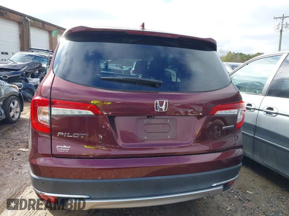 2020 Honda Pilot Touring 8-Passenger with VIN 5FNYF5H94LB012062, listed as a IAAI auction lot 40806740 with 115,431 mi miles and . Bid and sale history available at DreamBid. Image 16.
