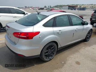 2016 Ford Focus SE with VIN 1FADP3F24GL295366, listed as a IAAI auction lot 42268573 with 71,462 mi miles and . Bid and sale history available at DreamBid. Image 4.