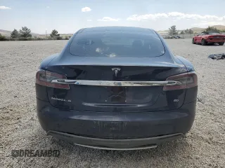 2014 Tesla Model S 60 with VIN 5YJSA1S12EFP29885, listed as a Copart auction lot 59769215 with Not provided miles and Salvage title. Bid and sale history available at DreamBid. Image 6.