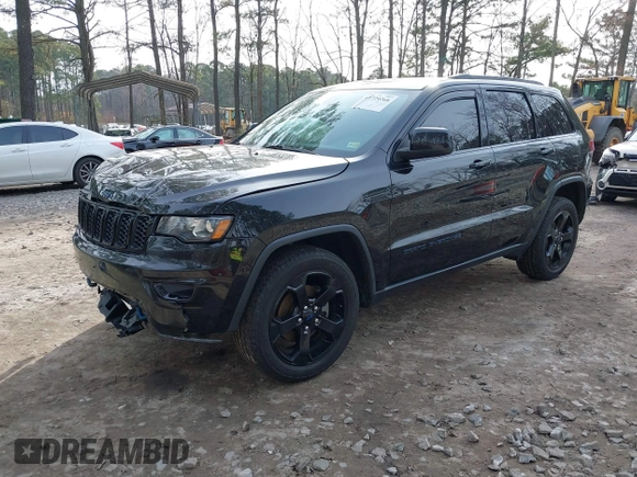 2018 Jeep Grand Cherokee Laredo E with VIN 1C4RJFAG1JC426542, listed as a IAAI auction lot 41729268 with 106,024 mi miles and . Bid and sale history available at DreamBid. Image 2.
