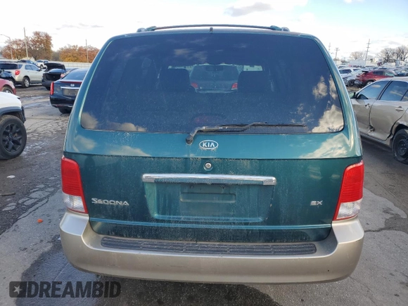 2002 Kia Sedona LX with VIN KNDUP131426217512, listed as a Copart auction lot 80928774 with 163,176 mi miles and Salvage Title. Bid and sale history available at carsss.com. Image 6.