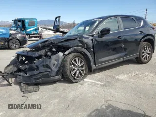 2018 Mazda CX-5 Touring z VIN JM3KFBCM4J0444167, wystawiony jako Copart lot #45900645 z przebiegiem 85 881 mil mil oraz Czysty tytuł • Clean title. Historia ofert i sprzedaży dostępna na DreamBid. Obrazek 1.