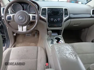 2011 Jeep Grand Cherokee Laredo z VIN 1J4RR4GG5BC508211, wystawiony jako Copart lot #53729935 z przebiegiem 124 408 mil mil oraz Szkoda całkowita • Salvage title. Historia ofert i sprzedaży dostępna na DreamBid. Obrazek 8.