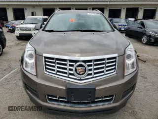 2014 Cadillac SRX Luxury Collection z VIN 3GYFNBE3XES626319, wystawiony jako Copart lot #54776405 z przebiegiem 107 734 mil mil oraz Szkody całkowita. Historia ofert i sprzedaży dostępna na DreamBid. Obrazek 5.