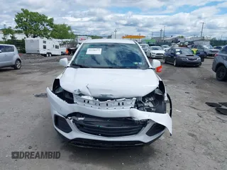 2021 Chevrolet Trax LS with VIN KL7CJKSB8MB302437, listed as a IAAI auction lot 42340173 with 26,159 mi miles and . Bid and sale history available at DreamBid. Image 6.