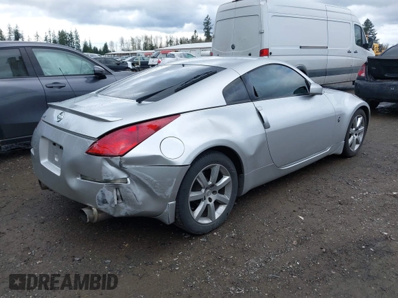 2004 Nissan 350Z Touring with VIN JN1AZ34E64T061197, listed as a IAAI auction lot 41917013 with 70,121 mi miles. Bid and sale history available at carsss.com. Image 4.
