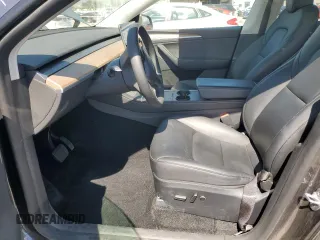 2024 Tesla Model Y Long Range z VIN 7SAYGDEE5RA244641, wystawiony jako Copart lot #51864845 z przebiegiem 23 096 mil mil oraz Szkoda całkowita • Salvage title. Historia ofert i sprzedaży dostępna na DreamBid. Obrazek 7.