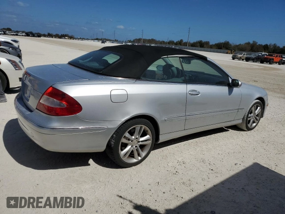 2007 Mercedes-Benz CLK-Class 3.5L with VIN WDBTK56FX7F206030, listed as a Copart auction lot 77271194 with 155,157 mi miles and Salvage Title. Bid and sale history available at carsss.com. Image 3.