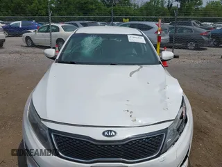 2015 Kia Optima LX with VIN 5XXGM4A71FG356034, listed as a IAAI auction lot 42402142 with 131,376 mi miles and . Bid and sale history available at DreamBid. Image 6.