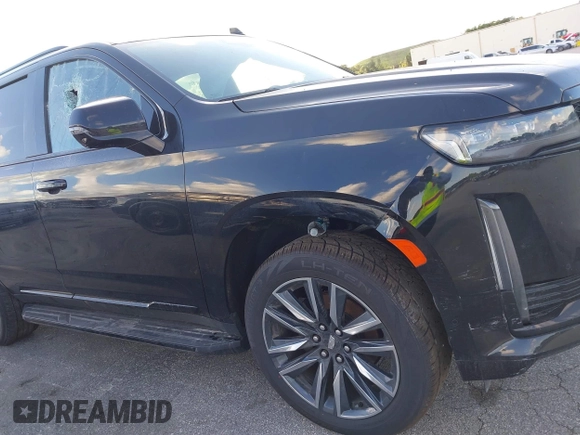2023 Cadillac Escalade 4WD Sport z VIN 1GYS4EKL2PR351882, wystawiony jako IAAI lot #41555895 z przebiegiem 58 703 mil mil oraz . Historia ofert i sprzedaży dostępna na DreamBid. Obrazek 18.