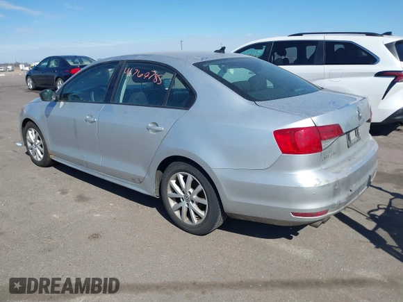 2015 Volkswagen Jetta Sedan 1.8T SE with VIN 3VWD17AJXFM324283, listed as a IAAI auction lot 41769785 with 103,686 mi miles. Bid and sale history available at carsss.com. Image 3.