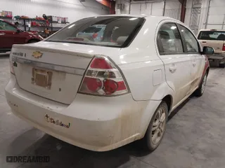 2011 Chevrolet Aveo LT w/1LT with VIN KL1TD5DE4BB118796, listed as a IAAI auction lot 41932392 with 128,034 mi miles. Bid and sale history available at carsss.com. Image 4.