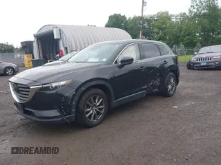 2020 Mazda CX-9 Touring with VIN JM3TCBCY5L0422262, listed as a IAAI auction lot 42456246 with 69,211 mi miles and . Bid and sale history available at DreamBid. Image 17.