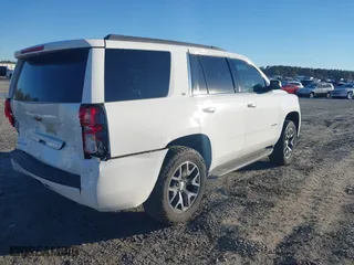 2017 Chevrolet Tahoe LT with VIN 1GNSCBKCXHR138873, listed as a IAAI auction lot 40904961 with 158,094 mi miles. Bid and sale history available at carsss.com. Image 4.