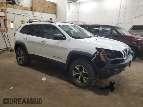 2014 Jeep Cherokee Trailhawk z VIN 1C4PJMBS0EW129300, wystawiony jako Copart lot #50782375 z przebiegiem 115 808 mil mil oraz Szkoda całkowita • Salvage title. Historia ofert i sprzedaży dostępna na DreamBid. Obrazek 4.