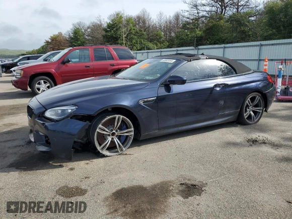 2015 BMW M6 with VIN WBSLZ9C59FD651474, listed as a Copart auction lot 60882454 with Not provided miles and Salvage title. Bid and sale history available at DreamBid. Image 1.
