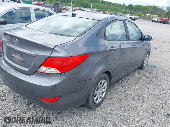 2014 Hyundai Accent GLS with VIN KMHCT4AE6EU670895, listed as a IAAI auction lot 42197066 with 142,983 mi miles and . Bid and sale history available at carsss.com. Image 4.