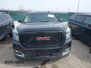 2016 GMC Yukon SLE with VIN 1GKS2AKC3GR398556, listed as a IAAI auction lot 41585972 with 130,961 mi miles. Bid and sale history available at carsss.com. Image 13.