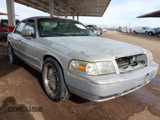 2006 Mercury Grand Marquis GS with VIN 2MEFM74VX6X638763, listed as a IAAI auction lot 41735612 with 123,914 mi miles and . Bid and sale history available at DreamBid. Image 1.