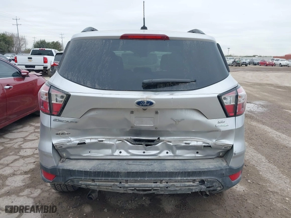 2018 Ford Escape SE with VIN 1FMCU0GD7JUB75362, listed as a IAAI auction lot 41320189 with 67,194 mi miles. Bid and sale history available at carsss.com. Image 17.