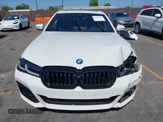 2023 BMW 5 Series 530e with VIN WBA13AG09PCM41820, listed as a IAAI auction lot 42409541 with 17,715 mi miles and . Bid and sale history available at DreamBid. Image 11.
