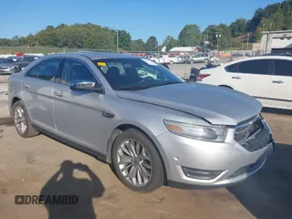 2014 Ford Taurus Limited with VIN 1FAHP2F8XEG133523, listed as a IAAI auction lot 40285220 with 134,939 mi miles. Bid and sale history available at carsss.com. Image 1.