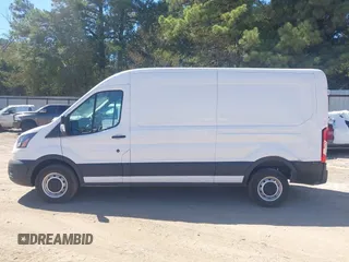 2022 Ford Transit Cargo with VIN 1FTBR1C84NKA76483, listed as a IAAI auction lot 40365786 with 28,854 mi miles and . Bid and sale history available at DreamBid. Image 14.