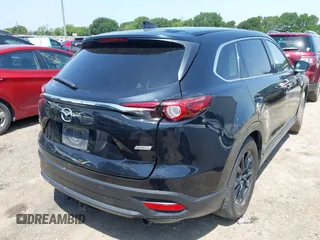 2016 Mazda CX-9 Touring with VIN JM3TCACY7G0101632, listed as a IAAI auction lot 42191115 with 163,070 mi miles and . Bid and sale history available at DreamBid. Image 4.