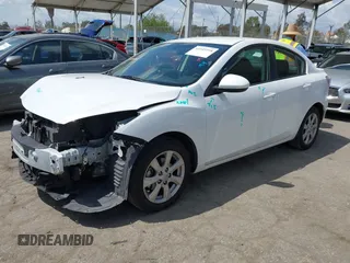 2011 Mazda 3 i Touring with VIN JM1BL1VG8B1478997, listed as a IAAI auction lot 41945998 with 111,784 mi miles and . Bid and sale history available at DreamBid. Image 18.