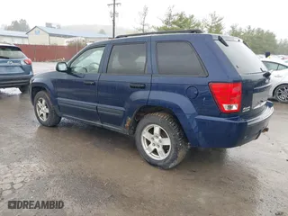 2006 Jeep Grand Cherokee Laredo with VIN 1J4GR48KX6C135070, listed as a IAAI auction lot 41966282 with 142,833 mi miles. Bid and sale history available at carsss.com. Image 3.