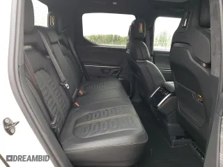 2022 Rivian R1T Adventure Package with VIN 7FCTGAAA8NN012505, listed as a Copart auction lot 72496734 with 5,916 mi miles and Salvage Title. Bid and sale history available at carsss.com. Image 10.